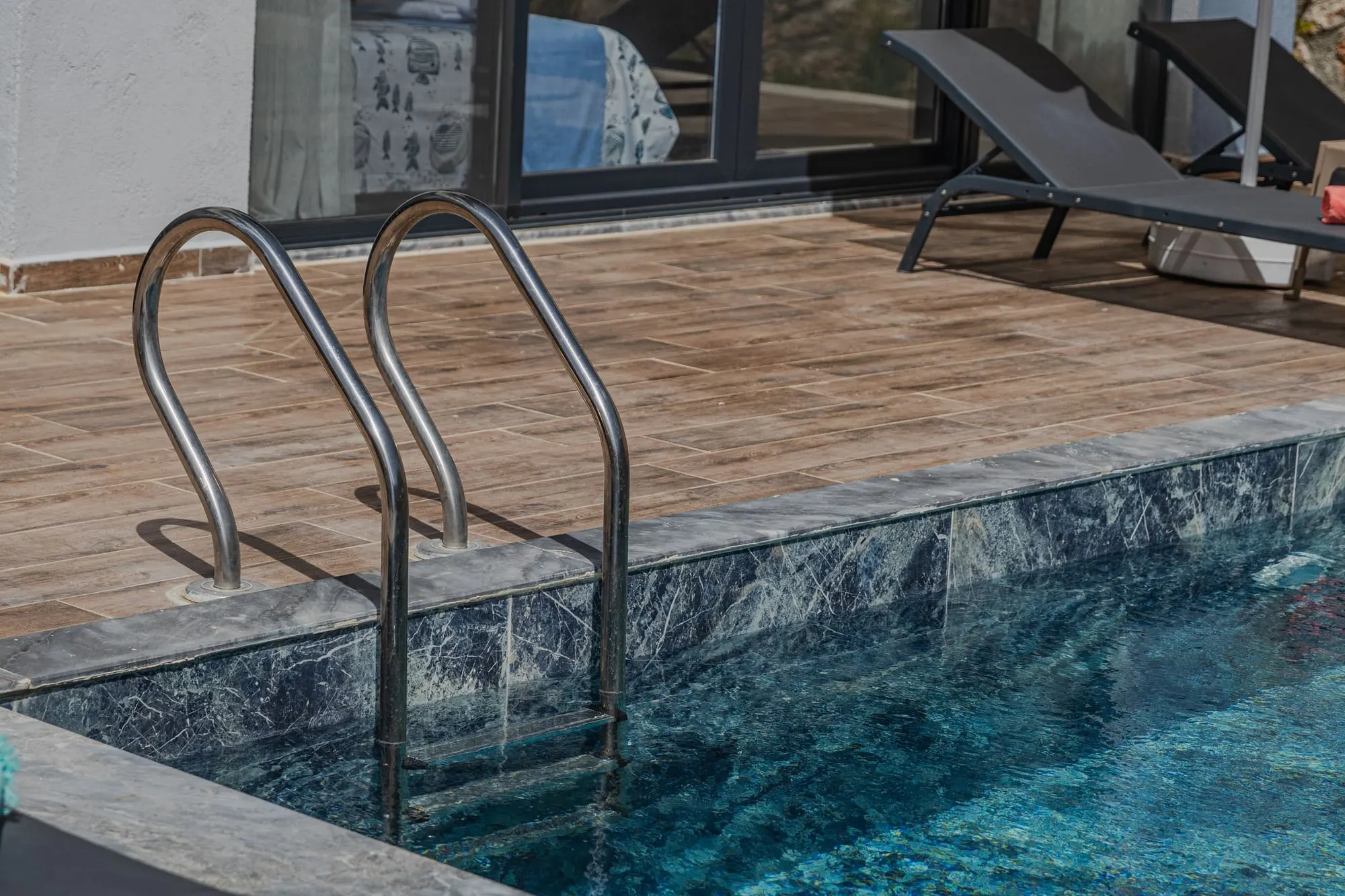 Natural stone coping and pool deck